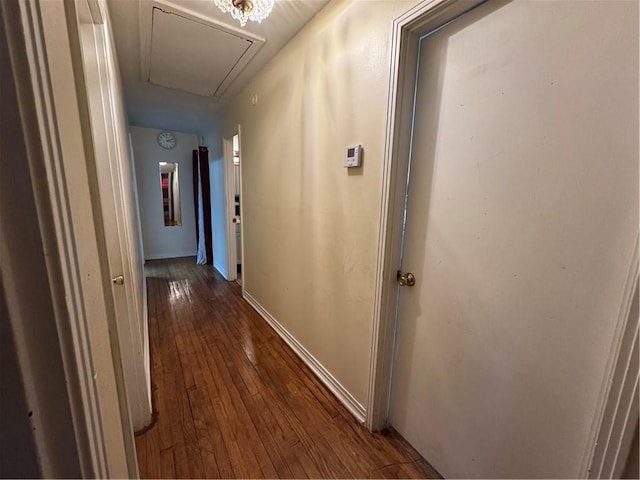 hall with dark hardwood / wood-style floors