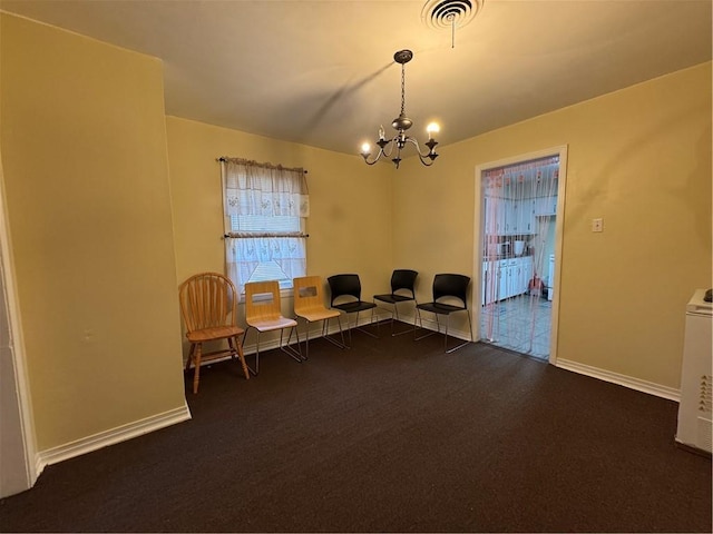 office featuring a chandelier