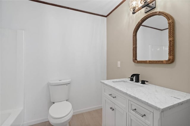 8520 Lebaron Ave W, Citronelle, AL 36522 - bathroom featuring crown molding, vanity, and wood finished floors