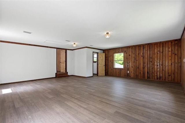 8520 Lebaron Ave W, Citronelle, AL 36522 - spare room featuring wood finished floors and crown molding