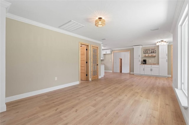 8520 Lebaron Ave W, Citronelle, AL 36522 - unfurnished living room with ornamental molding and light wood-style floors