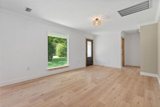 8520 Lebaron Ave W, Citronelle, AL 36522 - spare room with crown molding and light wood-style floors