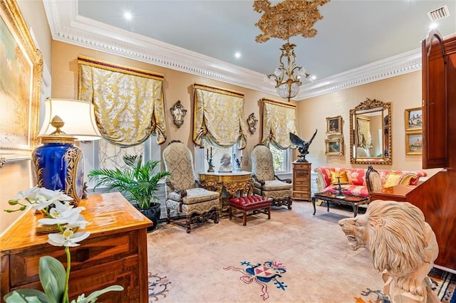 living area featuring visible vents, carpet, ornamental molding, and a notable chandelier