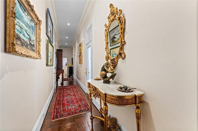 corridor with recessed lighting, baseboards, and ornamental molding