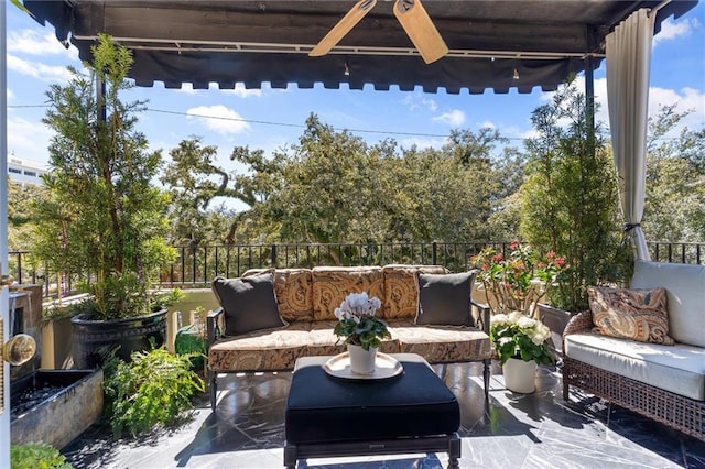 view of patio / terrace featuring a ceiling fan and outdoor lounge area