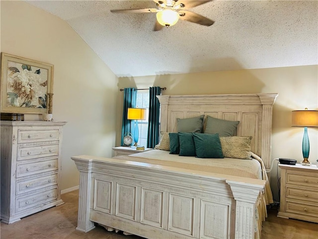 bedroom featuring baseboards, ceiling fan, carpet, vaulted ceiling, and a textured ceiling