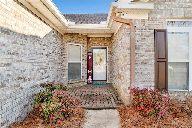 entrance to property featuring a patio