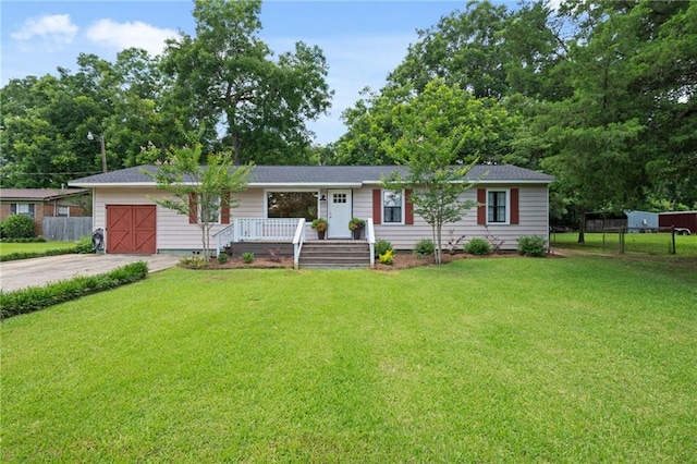 4950 Santos Dr E, Mobile, AL 36619 - ranch-style house featuring a garage, driveway, and a porch