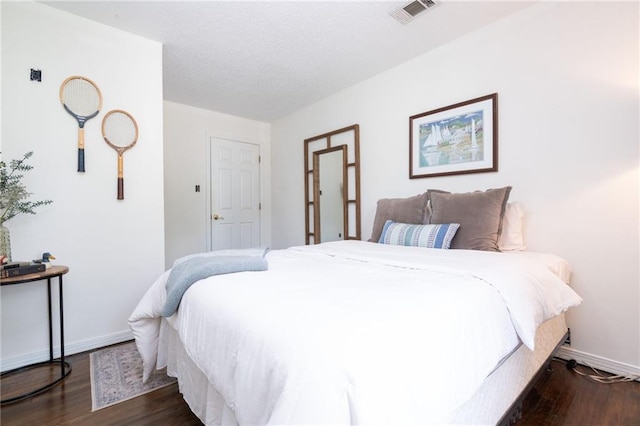 4950 Santos Dr E, Mobile, AL 36619 - bedroom with wood finished floors and baseboards