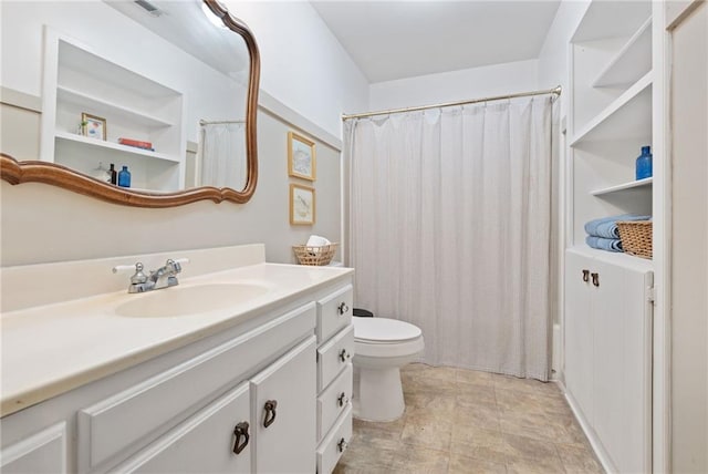 4950 Santos Dr E, Mobile, AL 36619 - bathroom featuring vanity, toilet, and curtained shower
