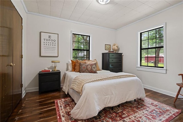 4950 Santos Dr E, Mobile, AL 36619 - bedroom with ornamental molding, dark wood finished floors, and baseboards