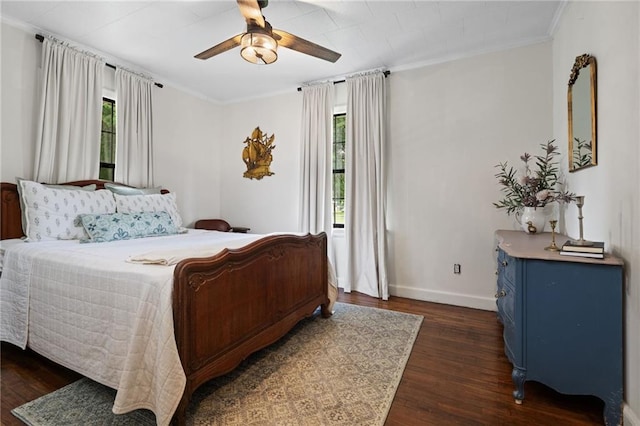 4950 Santos Dr E, Mobile, AL 36619 - bedroom featuring multiple windows, dark wood-style flooring, ornamental molding, baseboards, and ceiling fan