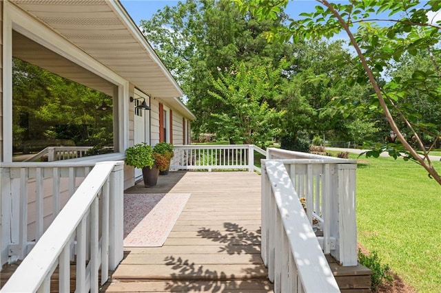 4950 Santos Dr E, Mobile, AL 36619 - wooden terrace featuring a lawn