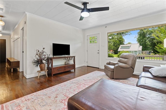 4950 Santos Dr E, Mobile, AL 36619 - living area with wood finished floors, ceiling fan, baseboards, and ornamental molding