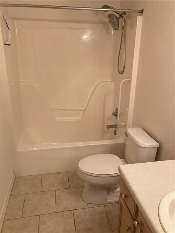 full bathroom with shower / bathtub combination, vanity, tile patterned flooring, and toilet