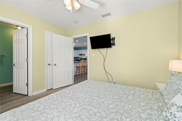 2528 Bridgeview Dr, Dauphin Island, AL 36528 - bedroom featuring wood finished floors and a ceiling fan