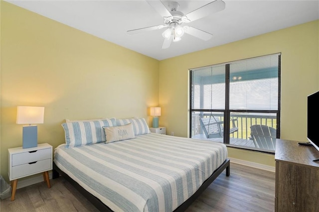 2528 Bridgeview Dr, Dauphin Island, AL 36528 - bedroom with wood finished floors and ceiling fan