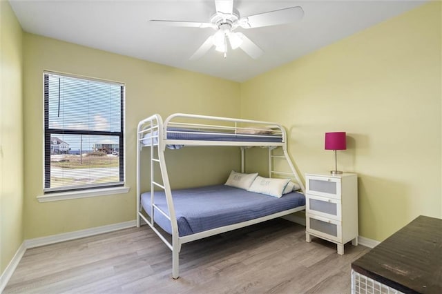 2528 Bridgeview Dr, Dauphin Island, AL 36528 - bedroom with wood finished floors and a ceiling fan