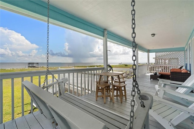 2528 Bridgeview Dr, Dauphin Island, AL 36528 - deck featuring view of water and beach and a yard