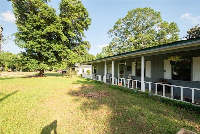 view of yard featuring a porch