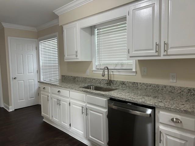 13580 Laco Cooper Rd, Wilmer, AL 36587 - kitchen with stainless steel dishwasher, a sink, crown molding, white cabinetry, and dark wood-style floors