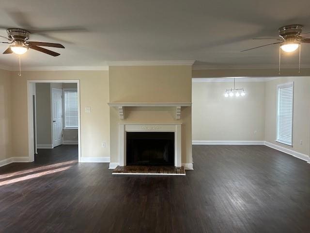 13580 Laco Cooper Rd, Wilmer, AL 36587 - unfurnished living room featuring a ceiling fan, dark wood-type flooring, baseboards, and crown molding