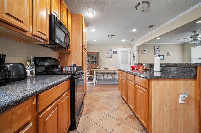 kitchen featuring visible vents, black appliances, a ceiling fan, a textured ceiling, and light tile patterned floors