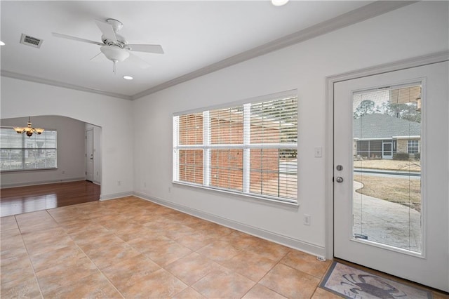 404 Savannah Ln, Foley, AL 36535 - interior space featuring plenty of natural light, arched walkways, visible vents, and crown molding