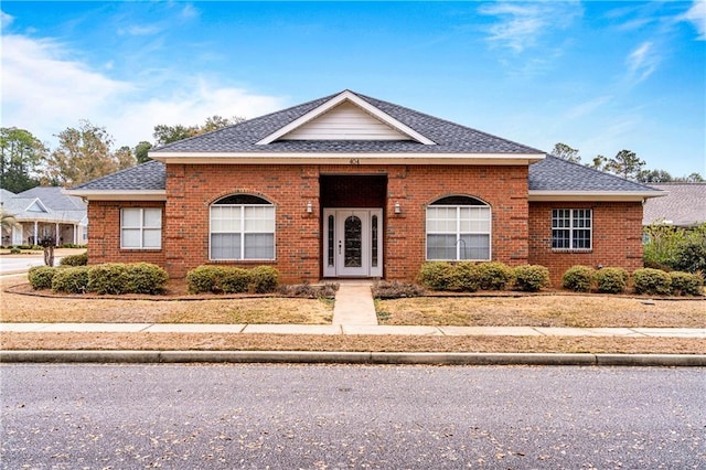 404 Savannah Ln, Foley, AL 36535 - view of front of home featuring roof with shingles and brick siding