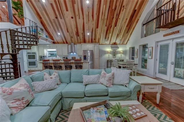 living room with french doors, wood-type flooring, high vaulted ceiling, and wooden ceiling