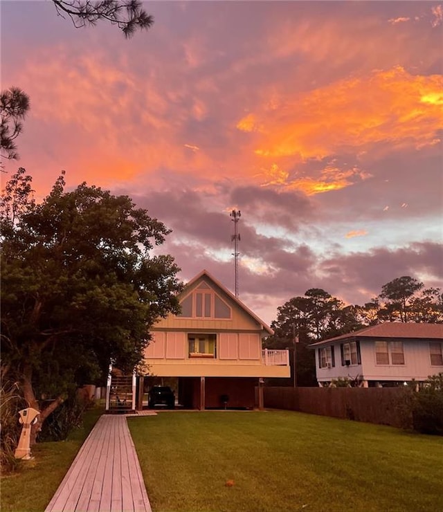 view of yard at dusk