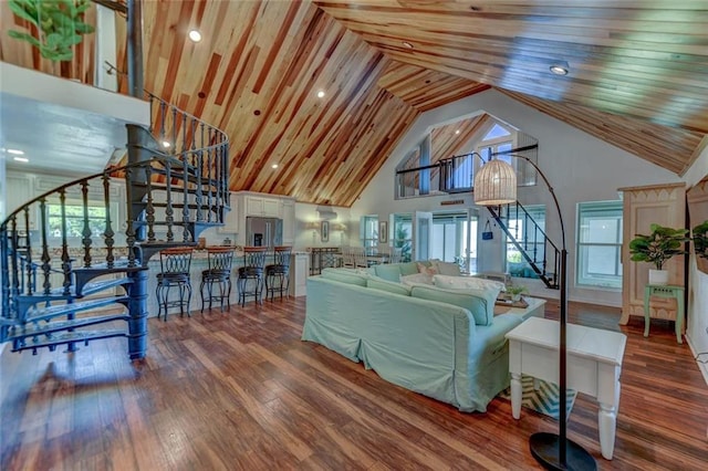 living room with wood ceiling, wood-type flooring, and high vaulted ceiling