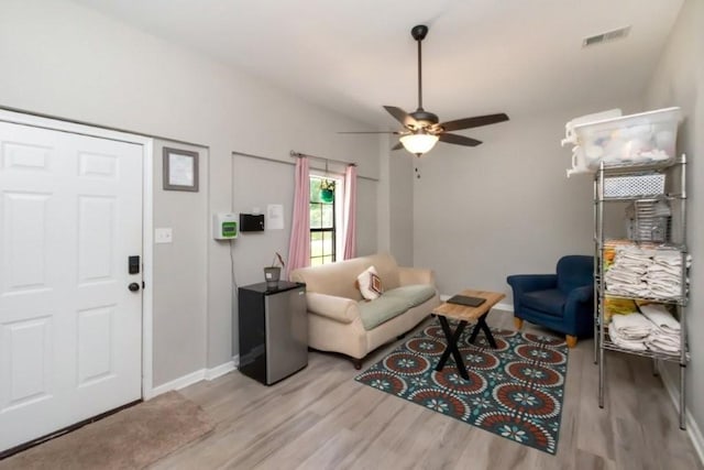 11525 Lott Rd, Chunchula, AL 36521 - living room featuring light wood finished floors and ceiling fan