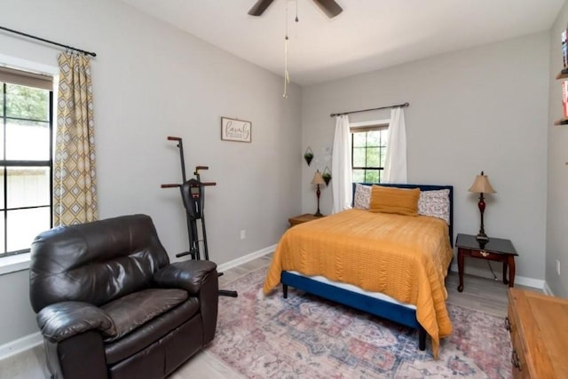 11525 Lott Rd, Chunchula, AL 36521 - bedroom with light wood-style floors and ceiling fan