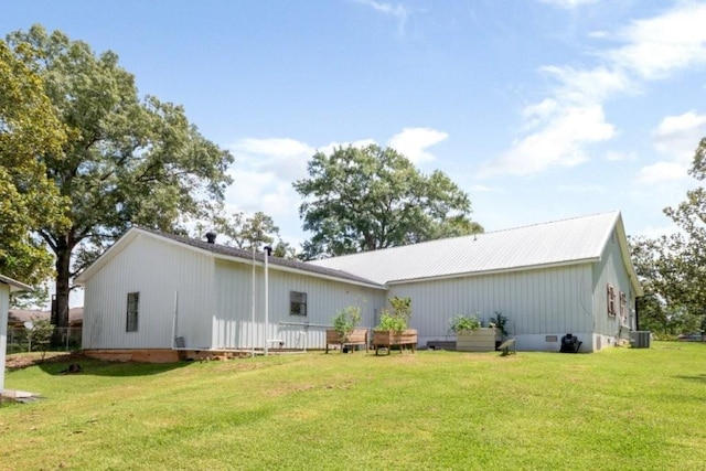 11525 Lott Rd, Chunchula, AL 36521 - back of house with a lawn