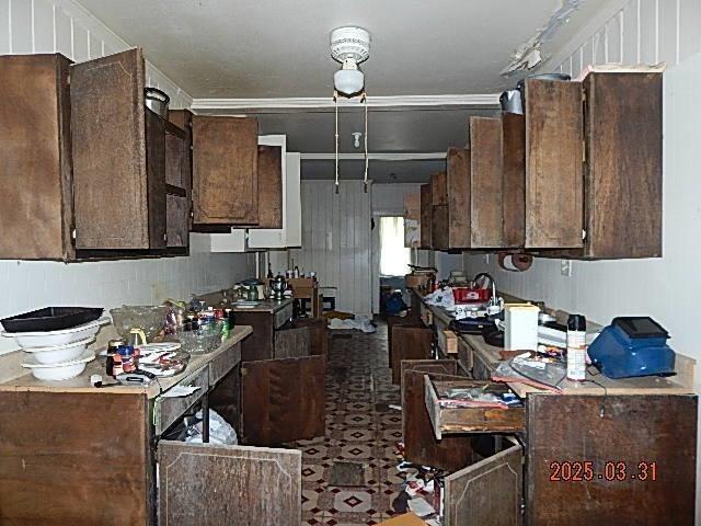 kitchen with dark brown cabinets
