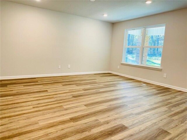 full bathroom featuring vanity, toilet, wood-type flooring, and bathtub / shower combination