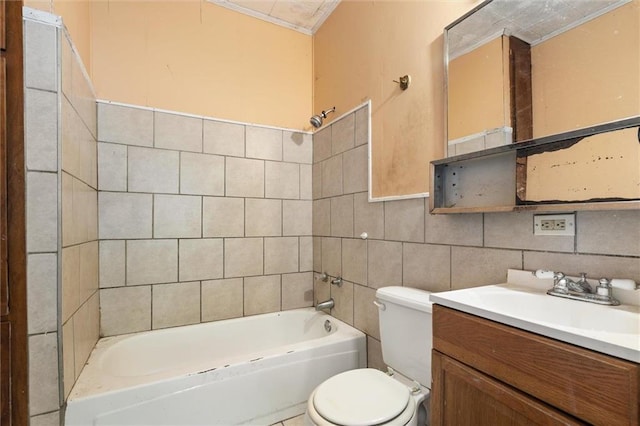 672 Burden St, Mobile, AL 36607 - full bath with tile walls, toilet, vanity, and  shower combination