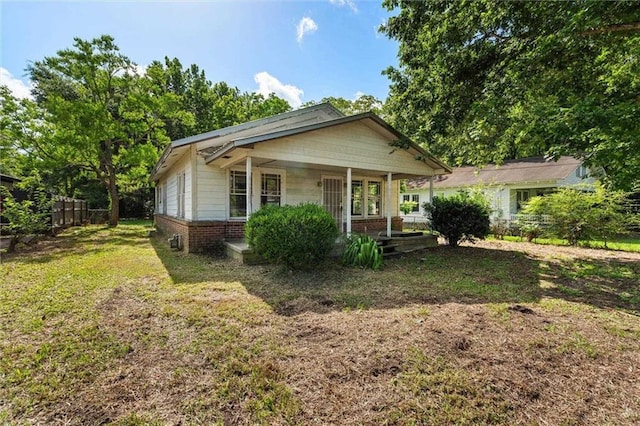 672 Burden St, Mobile, AL 36607 - view of front of house featuring a porch