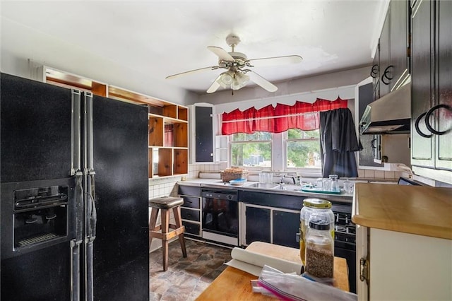 kitchen featuring ceiling fan, sink, ventilation hood, and black appliances