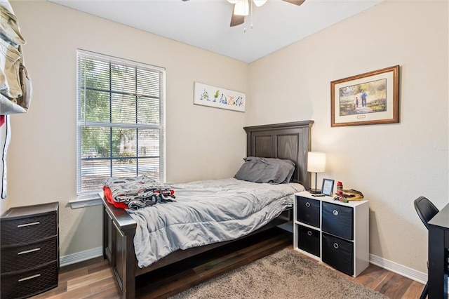 bedroom featuring wood-type flooring and ceiling fan