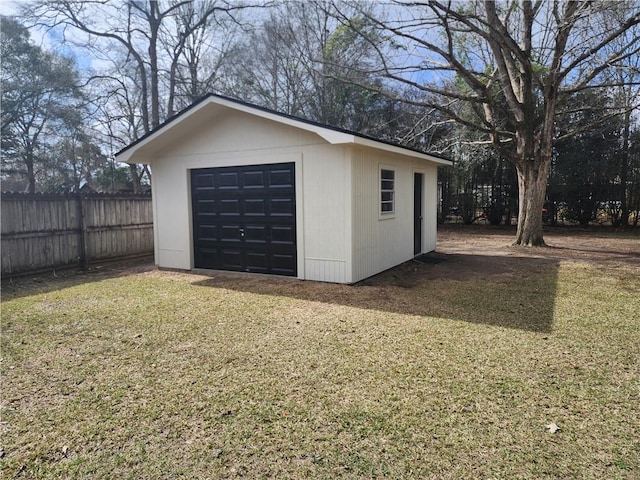 garage with a yard