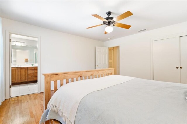 dining space with light hardwood / wood-style floors, crown molding, and a notable chandelier