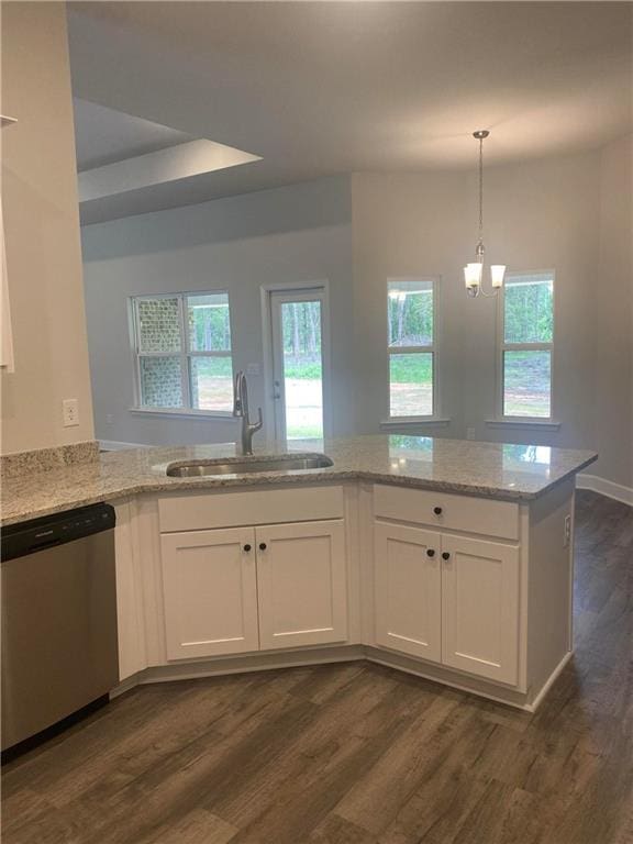 9577 Stone Rd, Semmes, AL 36575 - kitchen featuring stainless steel dishwasher, a sink, light stone countertops, white cabinets, and dark wood-style floors