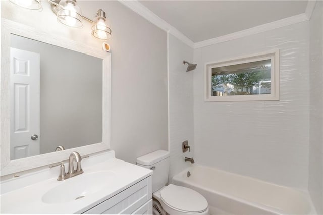 full bathroom featuring crown molding, toilet, vanity, and tub / shower combination