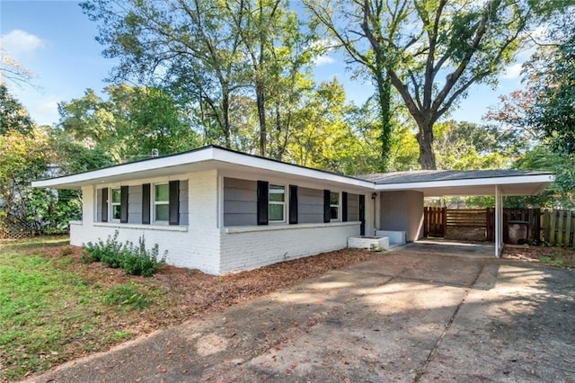 view of front of house featuring a carport