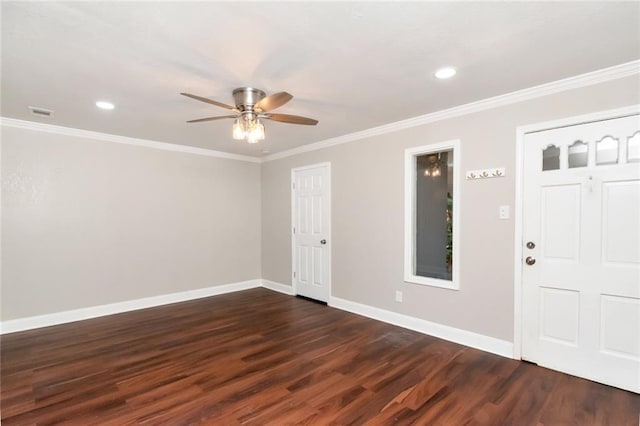 entryway with crown molding, ceiling fan, and dark hardwood / wood-style floors