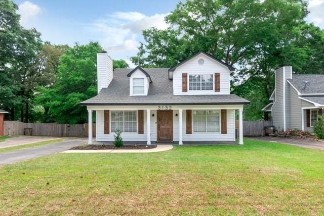 3132 Wellborne Dr W, Mobile, AL 36695 - view of front of property with a porch, a chimney, and driveway