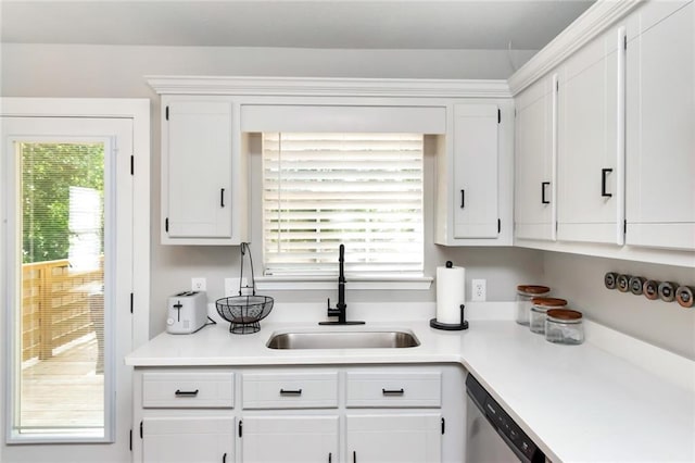 3132 Wellborne Dr W, Mobile, AL 36695 - kitchen with white cabinets, light countertops, and dishwasher