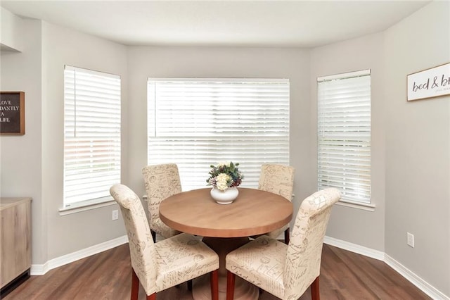 3132 Wellborne Dr W, Mobile, AL 36695 - dining space with dark wood finished floors and baseboards